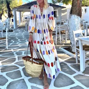 Langes Boho-Kleid mit buntem Blattmotiv